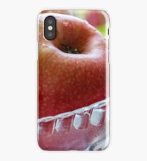 Ripe red apple in a dew in a glass bowl iPhone Case