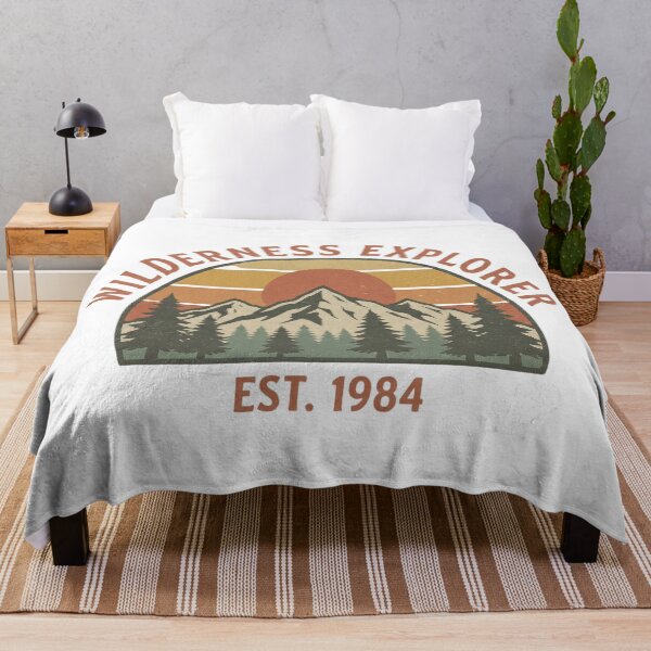 Item preview, Wilderness Explorer Est 1984 – Vintage Sunset Mountain Pine Tree Art designed and sold by Faith Threads.