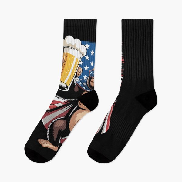 Item preview, Bigfoot American Flag Drinking Beer 4th Of July Patriotic designed and sold by KonstanKoraner.
