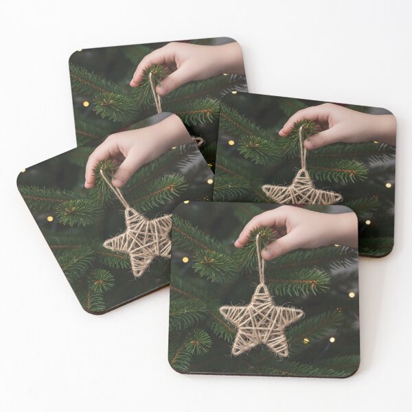 Item preview, Child's Hand Hanging a Rustic Twine Star Ornament designed and sold by homydesign.