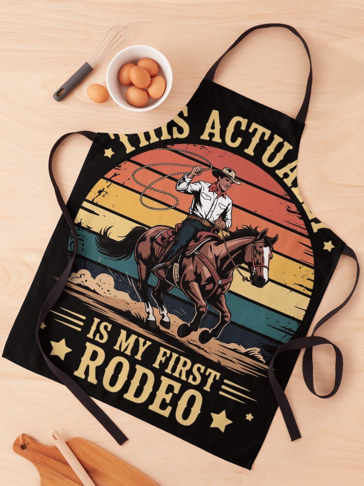 Thumbnail 1 of 6, Apron, This Actually Is My First Rodeo Country Life Howdy designed and sold by EntroRhim.