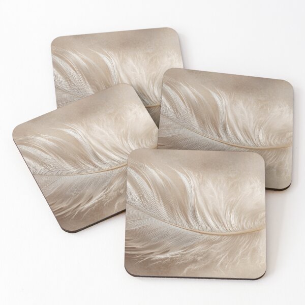 Item preview, Soft feather resting on a surface designed and sold by anytka.