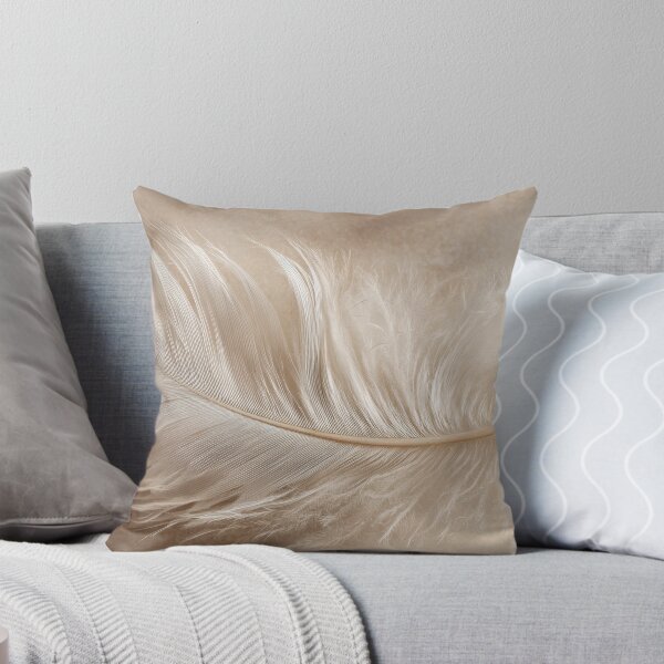 Item preview, Soft feather resting on a surface designed and sold by anytka.