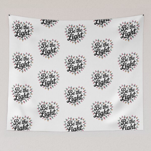 Item preview, Be the Light – Christmas Heart Lights T-shirt designed and sold by FestivityFinds.