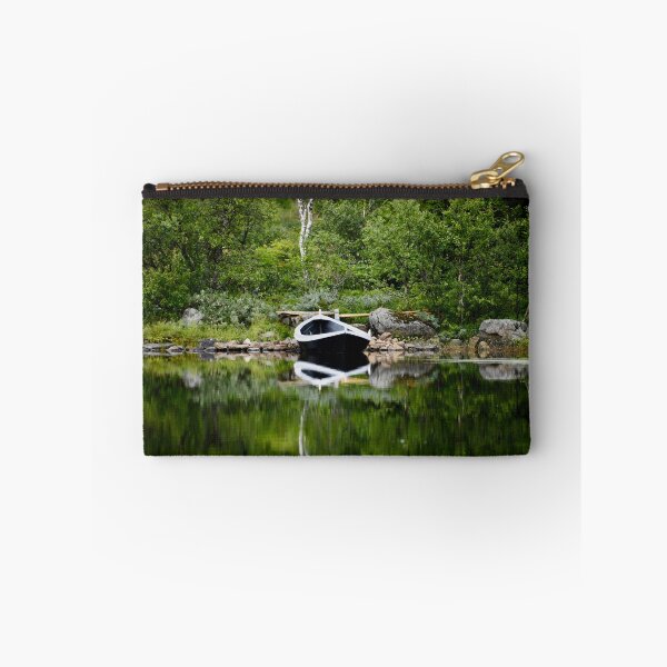 Item preview, Scandinavian Seascape – Black Boat in a Mirror Forest / Swiss Artwork Photography designed and sold by Raphael Wolf.