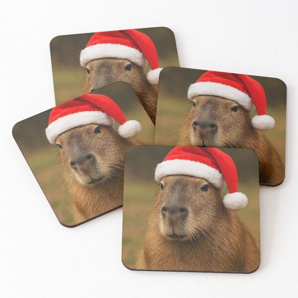 Item preview, Cute Adult Capybara with Red Santa Hat designed and sold by EmeraldeaArt.