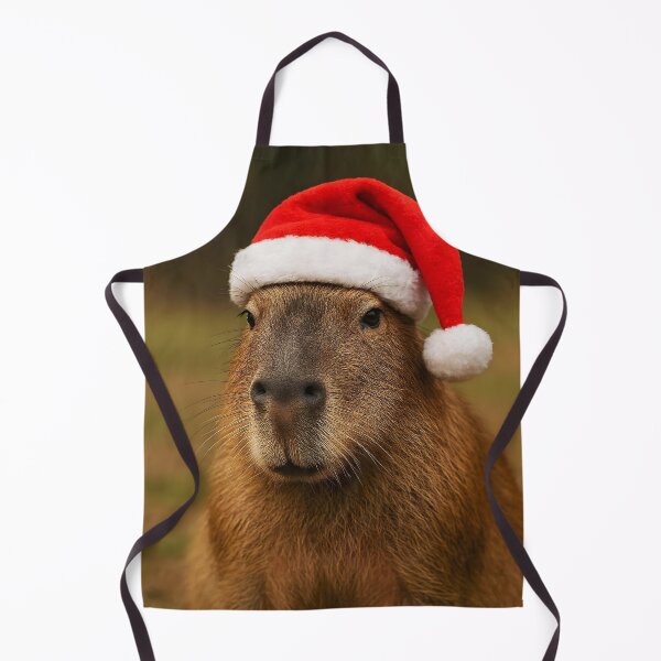 Item preview, Cute Adult Capybara with Red Santa Hat designed and sold by EmeraldeaArt.