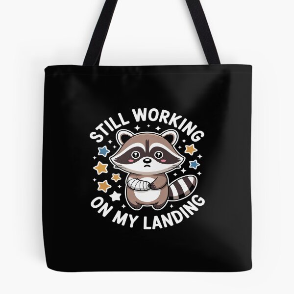 Item preview, Still Working On My Landing Injury Broken Arm Raccoon Cute designed and sold by velltoons.