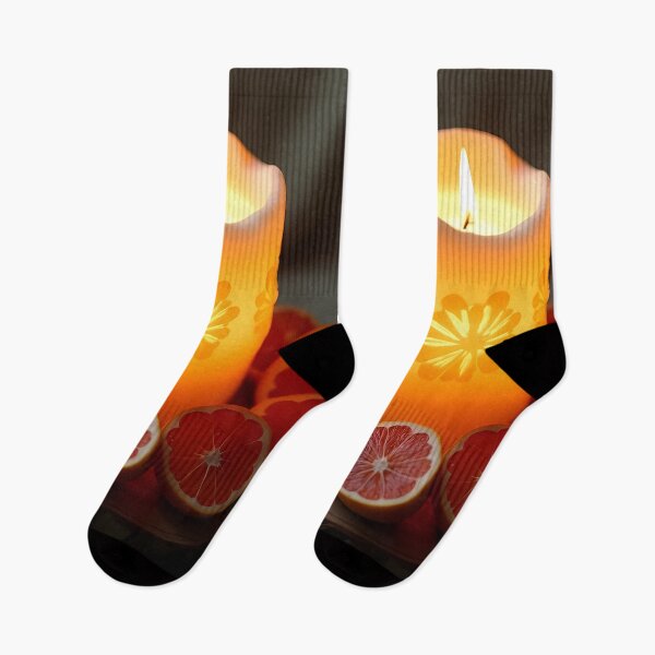 Item preview, Orange-colored ambiance: candle and grapefruit slices designed and sold by Mianku | Für das Leben.
