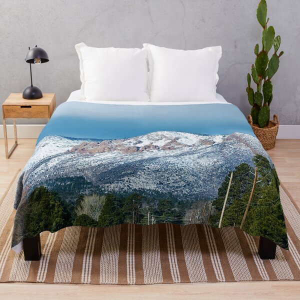 Item preview, Winter scene — Snow Capped Red Rock Mountain – Winter Road and Pine Forest Landscape Photography Print designed and sold by aadventures.
