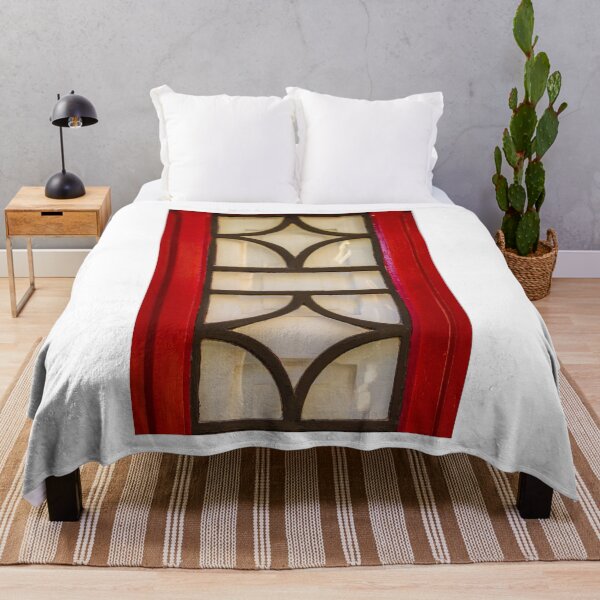 Item preview, Red Window With Black Iron Grille Featuring Curved Glass Panes and Ornate Pattern designed and sold by Nmallia.