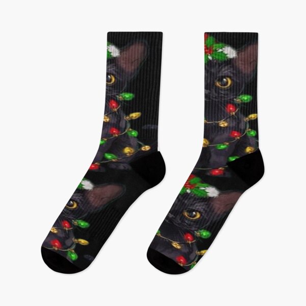 Item preview, Adorable Black Kitten Tangled in Christmas Lights designed and sold by Studio-DeLuz.