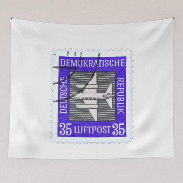 Item preview, Vintage East German Blue Aeroplane Postage Stamp designed and sold by red-amber65.