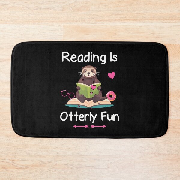 Item preview, Reading Is Otterly Fun Sea Otter Book Loving Librarian designed and sold by ChelseaEula.