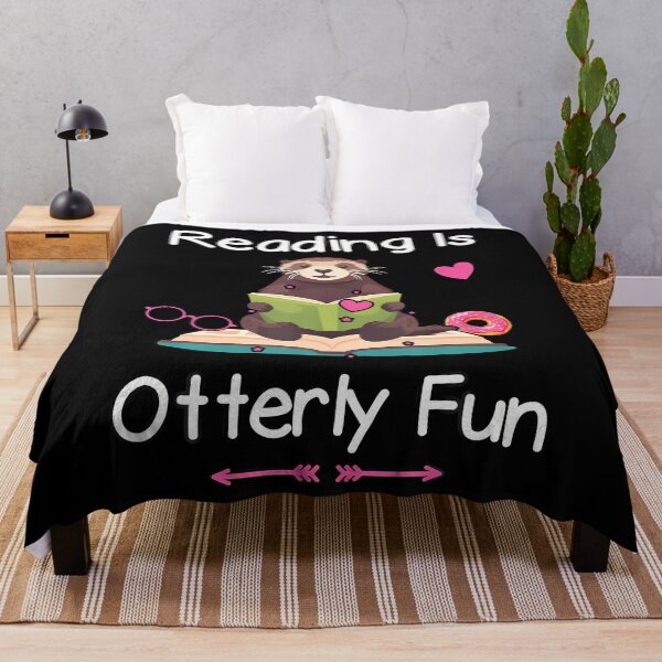 Item preview, Reading Is Otterly Fun Sea Otter Book Loving Librarian designed and sold by ChelseaEula.