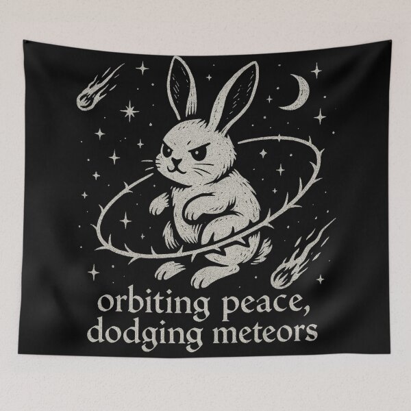 Item preview, Orbiting Peace Dodging Meteors | Cosmic Bunny Shirt | Chaos Humor Tee designed and sold by Mouraludia.