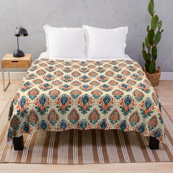 Item preview, Ikat seamless pattern with orange and navy tribal motifs on cream background. designed and sold by Opart Srinok.