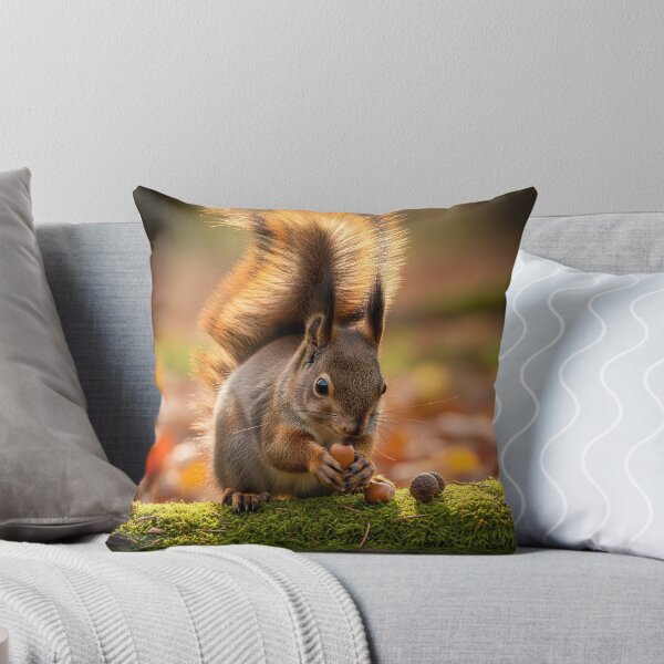 Item preview, A cute squirrel with a bushy tail, appearing calm, holds an acorn while perched on a moss-covered log in a forest designed and sold by homydesign.