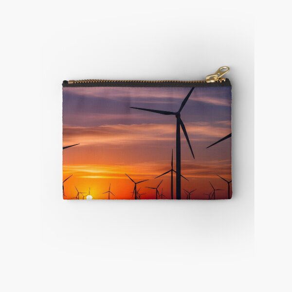 Item preview, A silhouette of numerous wind turbines stands against a vibrant orange and purple sunset, symbolizing renewable energy designed and sold by homydesign.