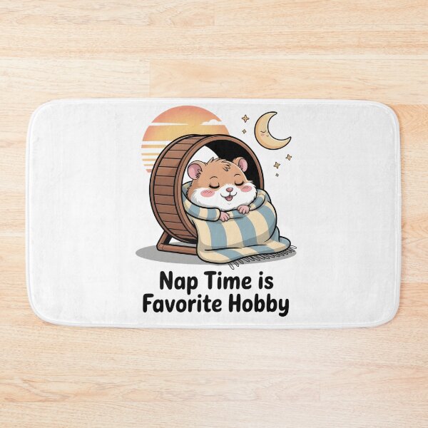 Item preview, A cartoon hamster sleeping on a running wheel with the phrase Nap time is a favorite pastime designed and sold by Pawmoods.