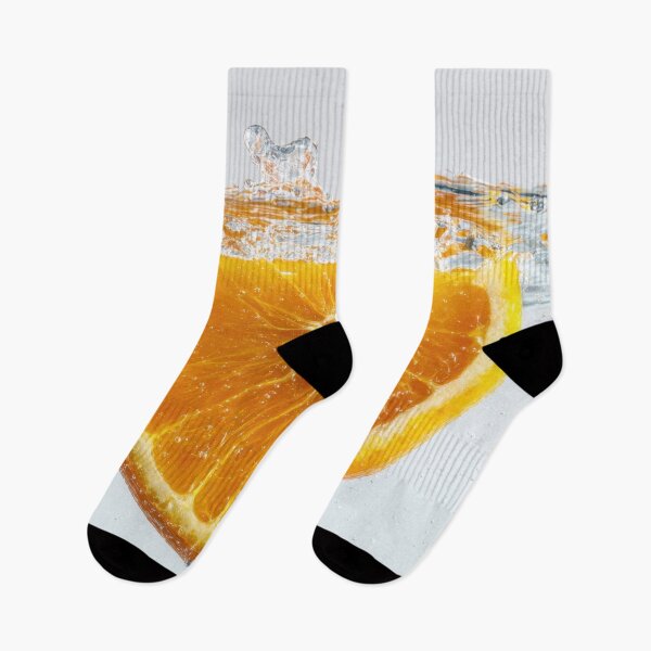 Item preview, Orange slice splashing in water designed and sold by anytka.