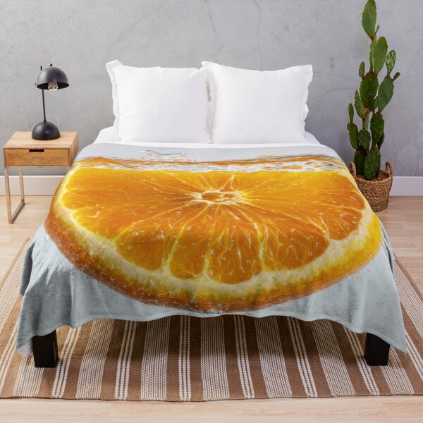 Item preview, Orange slice splashing in water designed and sold by anytka.