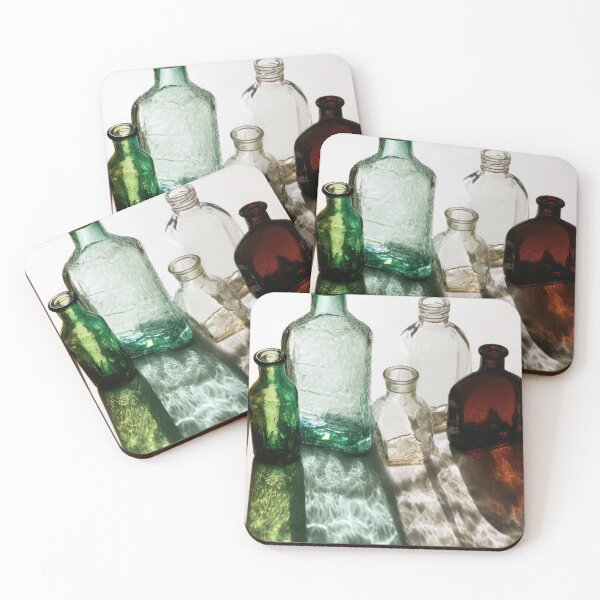 Item preview, Colored glass bottles on a table designed and sold by anytka.