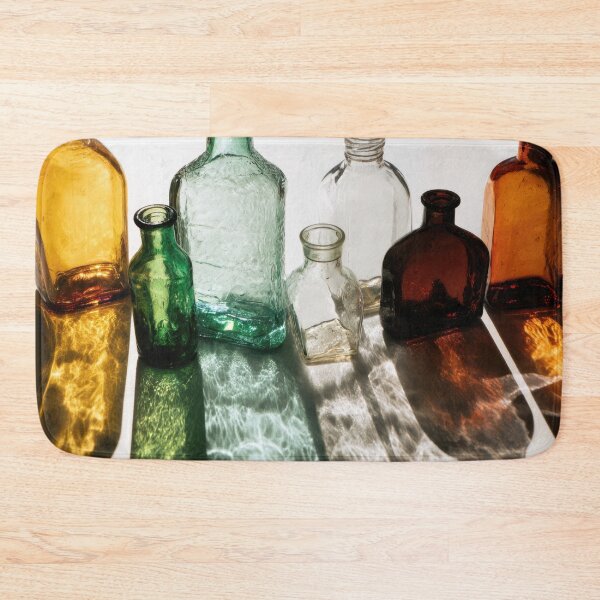 Item preview, Colored glass bottles on a table designed and sold by anytka.