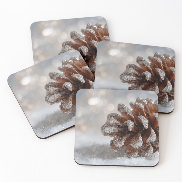 Item preview, Snow covers pine cone on ground designed and sold by anytka.
