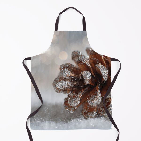 Item preview, Snow covers pine cone on ground designed and sold by anytka.