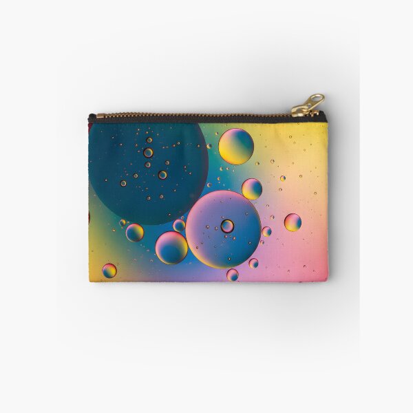 Item preview, Macro close up of oil drops on a vibrant colorful water surface designed and sold by homydesign.