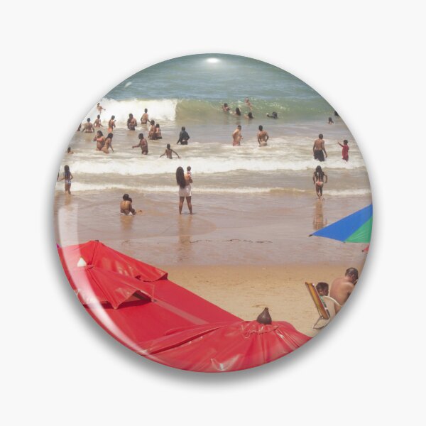 Item preview, red umbrellas on a crowded beach designed and sold by felipequeiroz.