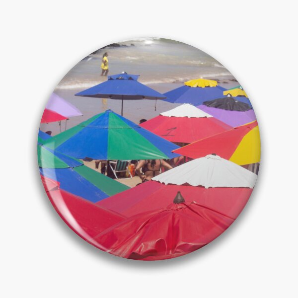 Item preview, several beach umbrellas piled up on a beach designed and sold by felipequeiroz.