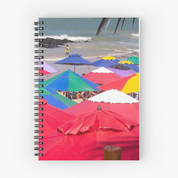 Item preview, several beach umbrellas piled up on a beach designed and sold by felipequeiroz.