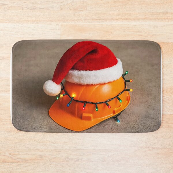Item preview, Orange-Yellow Safety Helmet with Santa Hat and Tangled Holiday Lights on Concrete designed and sold by EmeraldeaDesign.