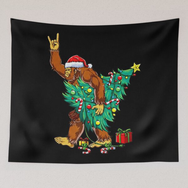 Item preview, Santa Bigfoot Rock Christmas Tree Funny Sasquatch Xmas  designed and sold by JEFDodsonArt.
