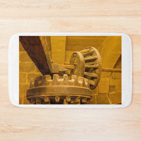 Item preview, Rusty Wooden Gear Mechanism Inside Historic Stone Workshop Under Warm Lighting designed and sold by Nmallia.