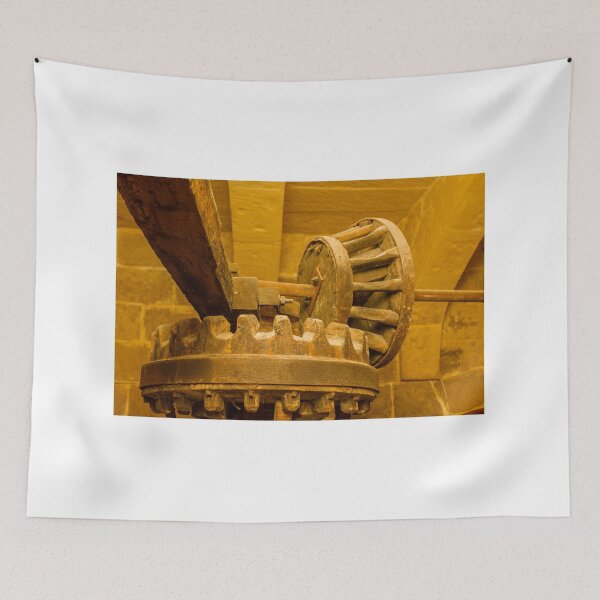 Item preview, Rusty Wooden Gear Mechanism Inside Historic Stone Workshop Under Warm Lighting designed and sold by Nmallia.