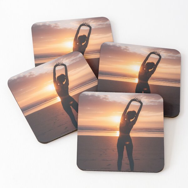 Item preview, Woman stretching arms overhead at sunset beach designed and sold by homydesign.