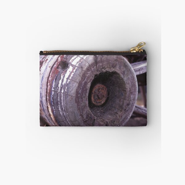 Item preview, Cobwebbed Hub: Weathered Wooden Cart Wheel Close-Up designed and sold by AnalogDays.