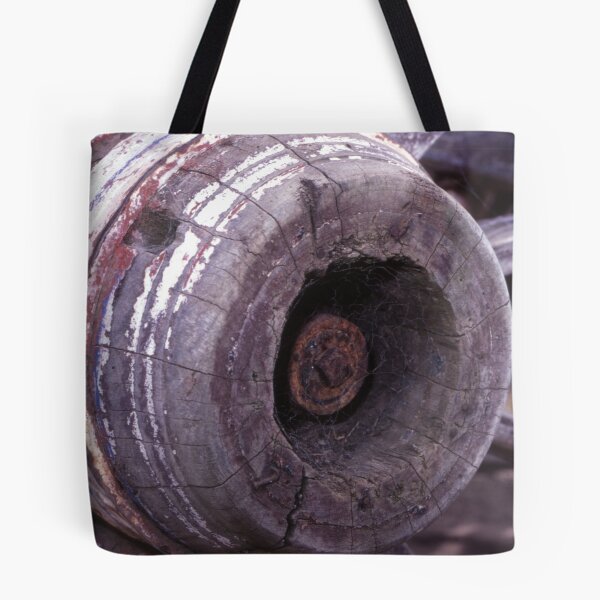 Item preview, Cobwebbed Hub: Weathered Wooden Cart Wheel Close-Up designed and sold by AnalogDays.
