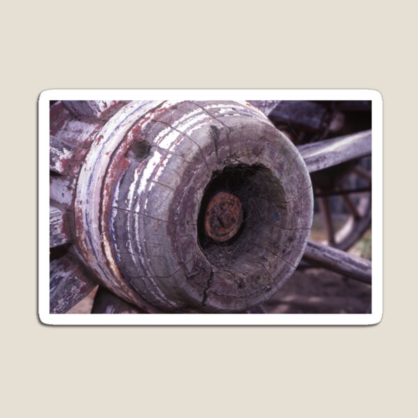Item preview, Cobwebbed Hub: Weathered Wooden Cart Wheel Close-Up designed and sold by AnalogDays.