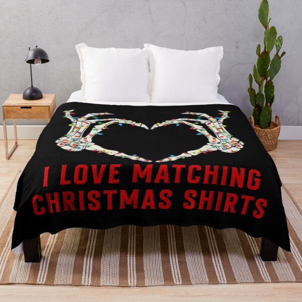 Item preview, I Love Matching Christmas Shirts Skeleton Hands Heart Holiday Lights designed and sold by DorikoKazan.