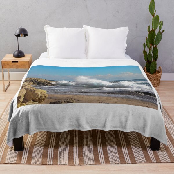 Item preview, Powerful Ocean Wave Crashes Against Rocky Shore on Sunny Beachfront designed and sold by Nmallia.
