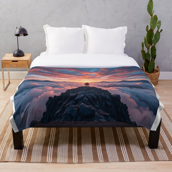 Item preview, Summit of Dreams – Lone Explorer Above the Clouds at Sunrise designed and sold by PixPixari.