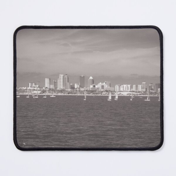 Item preview, The Tampa city skyline stretches across the waterfront, framed by vibrant clouds that reflect beautifully on the bay. designed and sold by EyezWatchin.