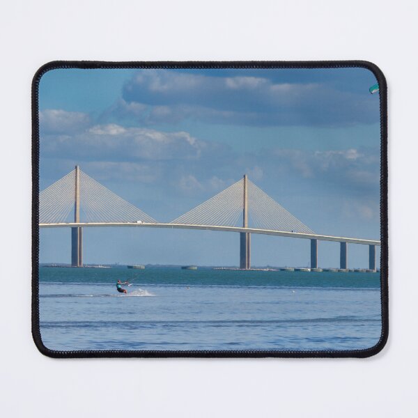 Item preview, The Sunshine Skyway Bridge rises dramatically over Tampa Bay as colorful kitesurfers glides designed and sold by EyezWatchin.