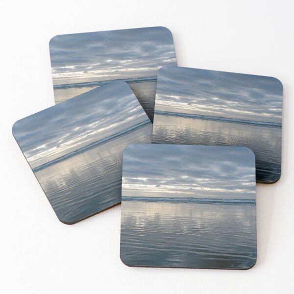 Item preview, Low tide with dramatic sky and wet sand in the foreground designed and sold by lisavonbiela.