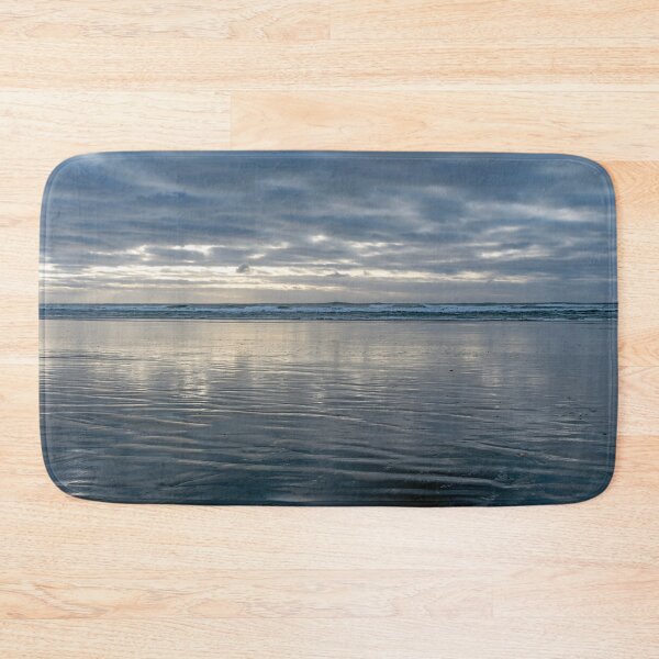 Item preview, Low tide with dramatic sky and wet sand in the foreground designed and sold by lisavonbiela.