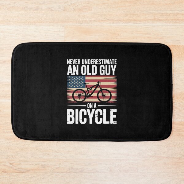 Item preview, never underestimate an old guy on a bicycle cycling 11  designed and sold by AquaKiev.